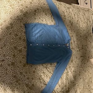 IZOD golf cardigan in light blue with white pearl button details